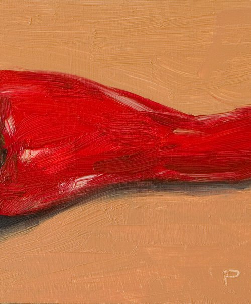 red pepper on ocher background by Olivier Payeur