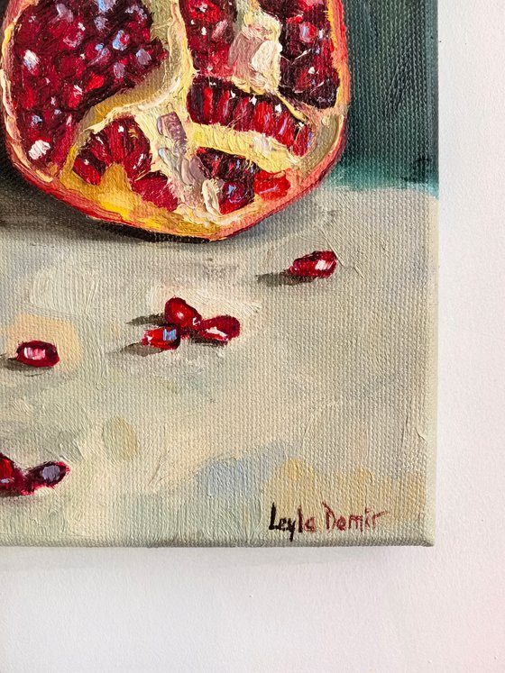 Pomegranate on blue