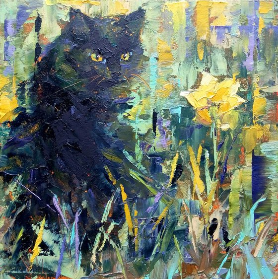 Black cat loves spring