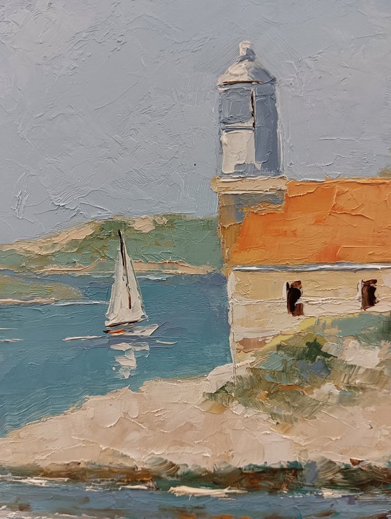 Lighthouse on Adriatic sea. Croatian coastline