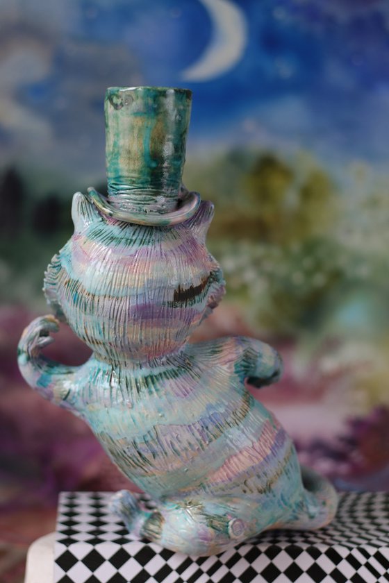 From the Alice in Wonderland. Cheshire Cat.  Clay sculpture.