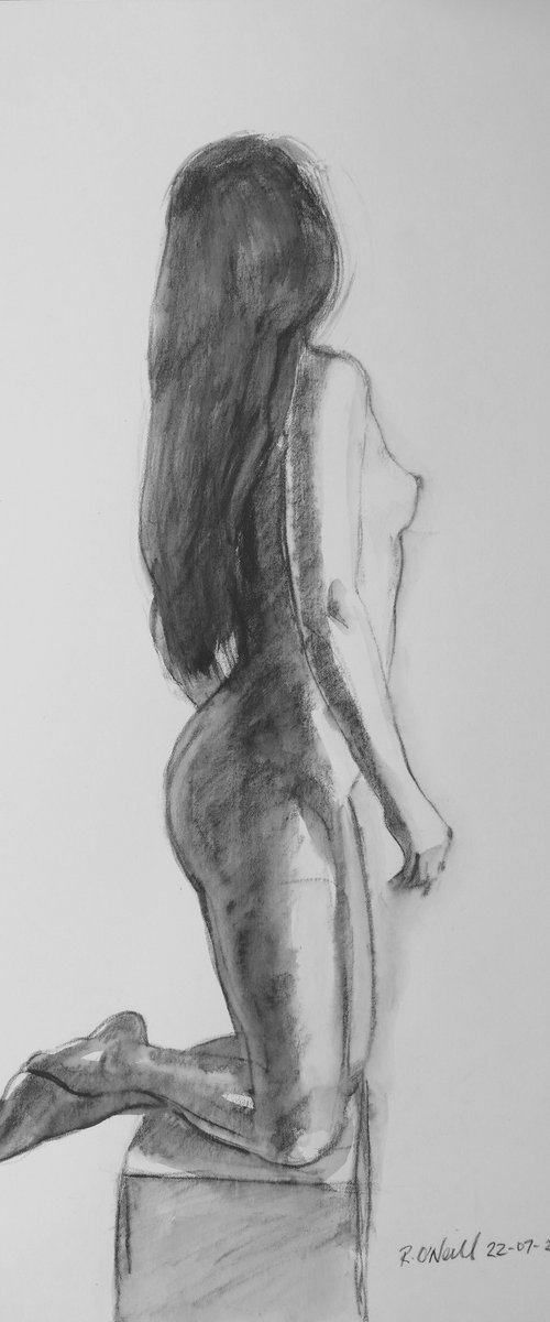 Kneeling female nude by Rory O’Neill