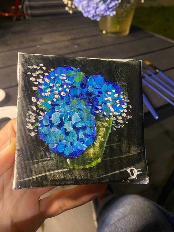 Still life with blue flowers