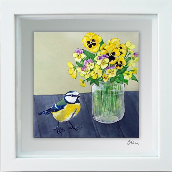 The blue tit and the pansies