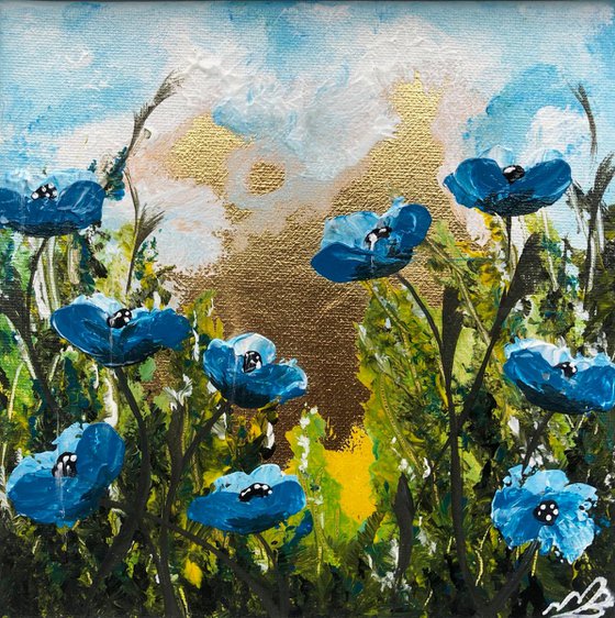 Blue poppies on gold leaf