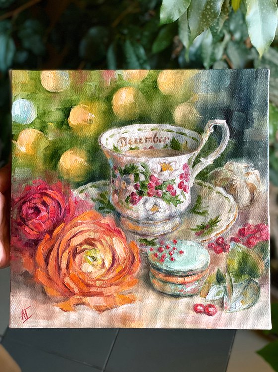 Christmas oil painting vintage cup, Ranunculus and macaron. Christmas lights, tree, beautiful new year gift. “December” vintage Royal Albert cup still life. Orange, green and red.