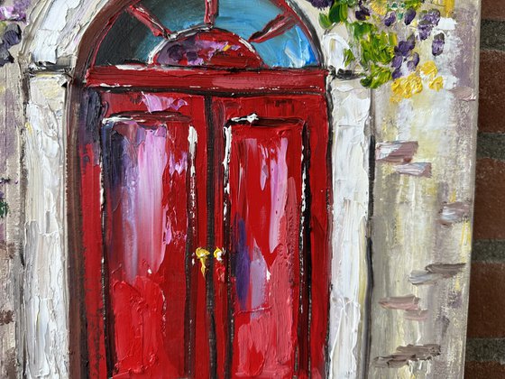 Red door with flowers