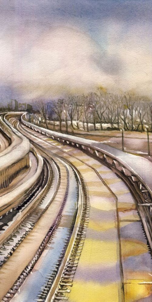 Snow covered train tracks by Alfred  Ng