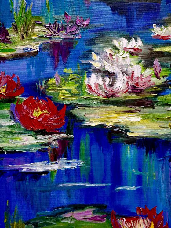 Pond of Claude Monet in Giverny  in summer bloom,  water lilies, irises