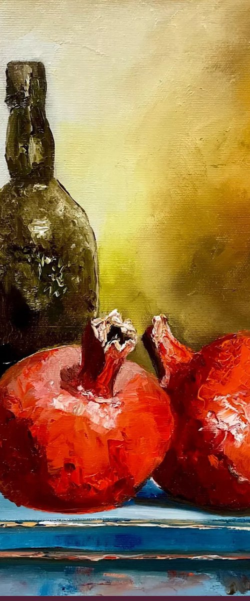Pomegranates and oil bottle by Olga Koval