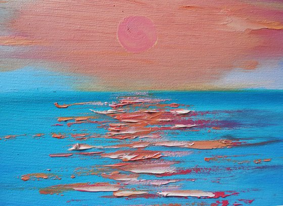 Sea Sunset with yachts and cityscape