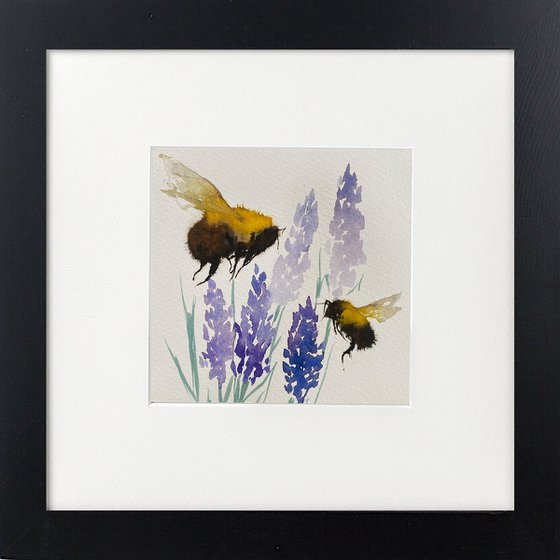 Two bee scenes framed