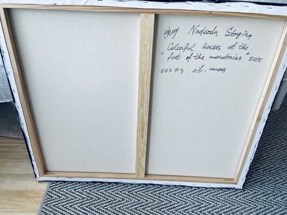 Colourful houses in the foot of the mountains