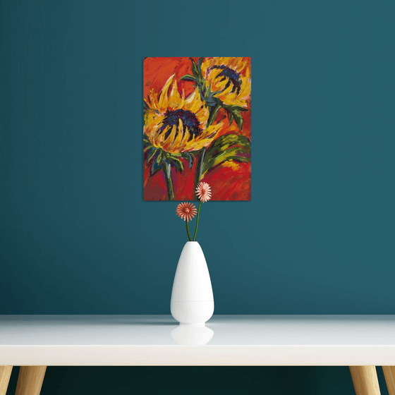 Sunflowers on a red background