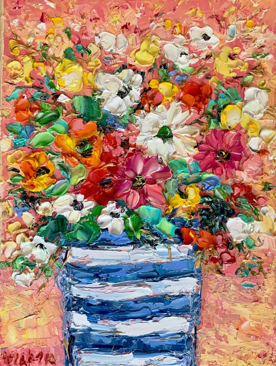 Flowers bouquet in striped vase