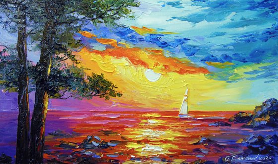 Sailing boat at sunset