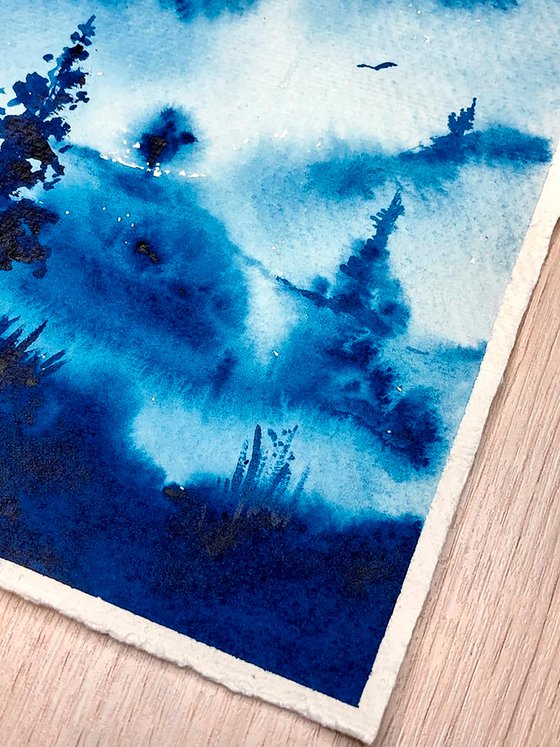 Blue misty forest.