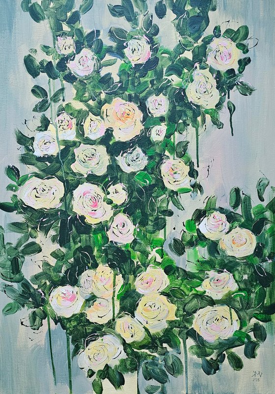 Blooming abstract rose garden in pale yellow