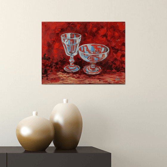 Wine glass on red.