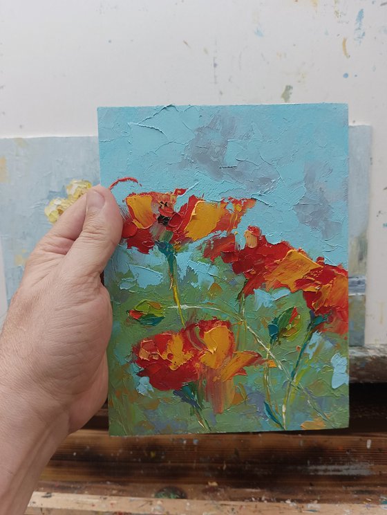 Small oil painting with poppy flowers.