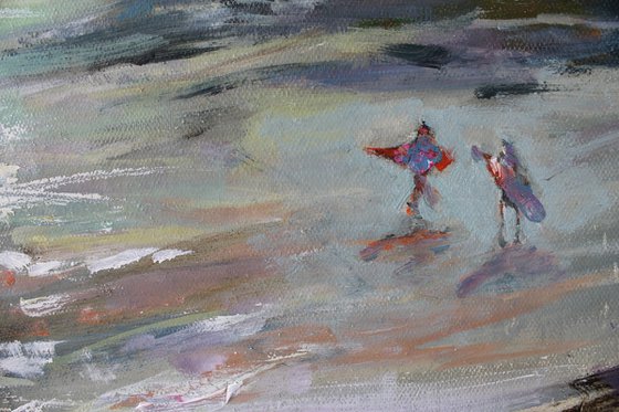 Surfing at sunset