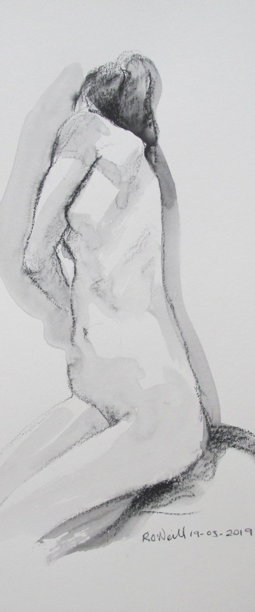 Kneeling female nude by Rory O’Neill