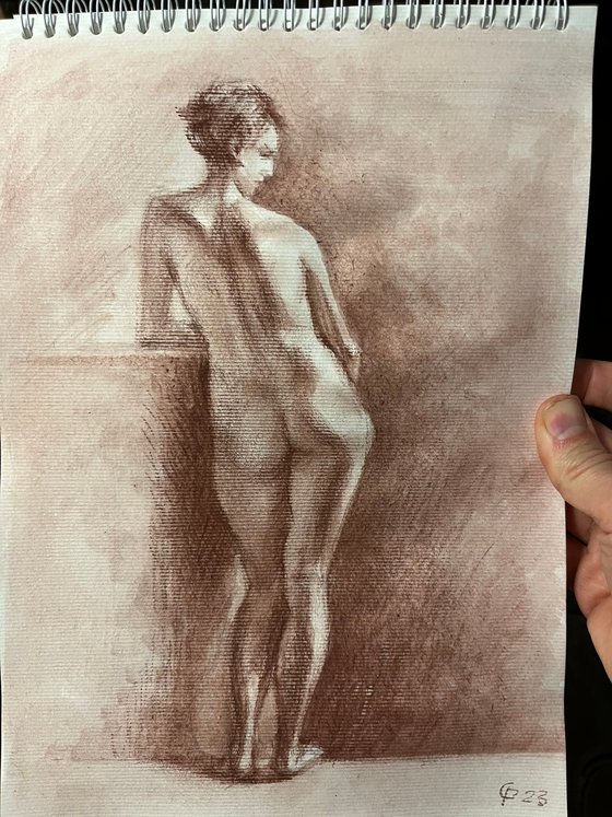 Nude girl figure from behind standing