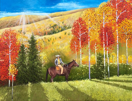 Cowboy in autumn forest