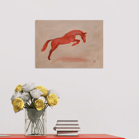 Jumping orange horse