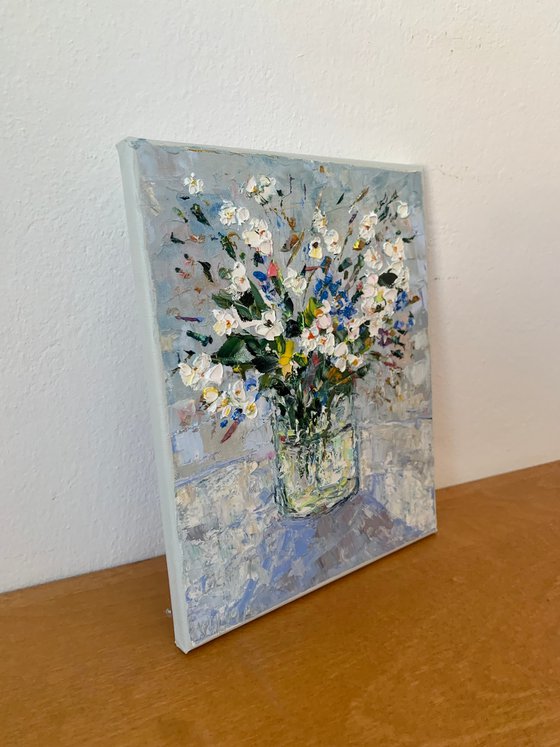 Still life with daisies and cornflowers