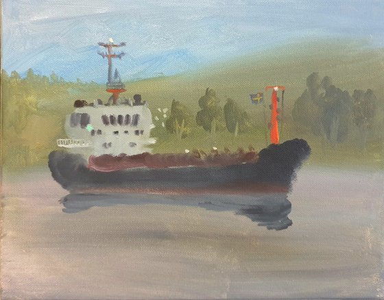 Seascape with cargo ship