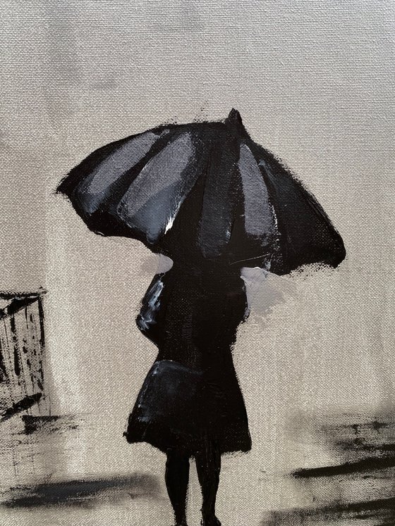 Woman with umbrella in Paris