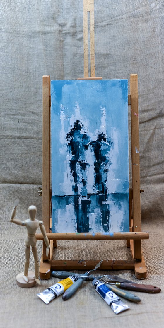 Two abstract figures on the street. Abstract figure art
