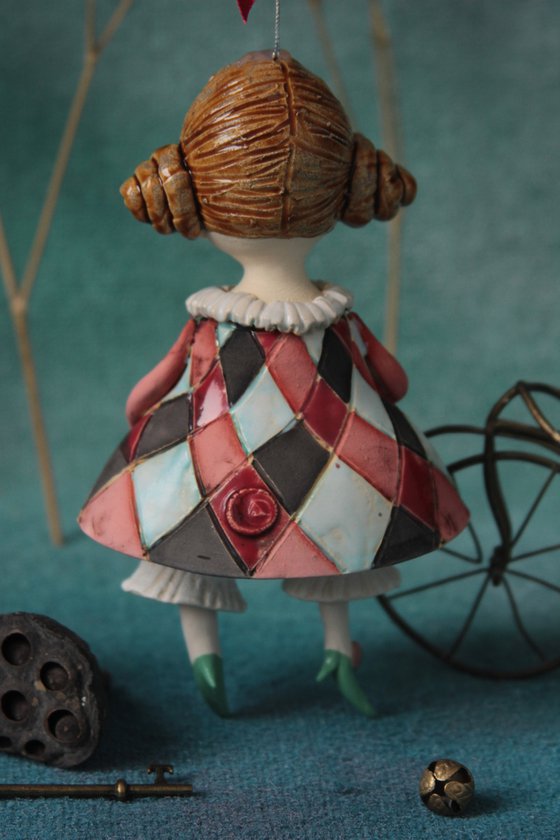 Little Girl in a harlequin dress. Hanging sculpture, bell doll by Elya Yalonetski