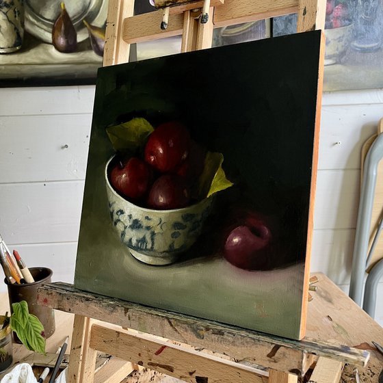 plums in a china bowl