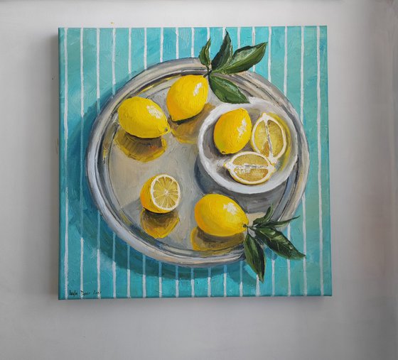 Lemons on turquoise stripen tablecloth