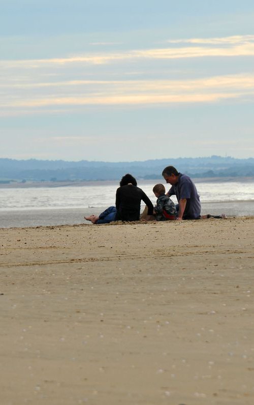 Family on Beach by Russ Witherington