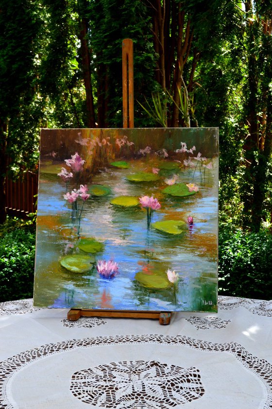 Pond with pink lilies