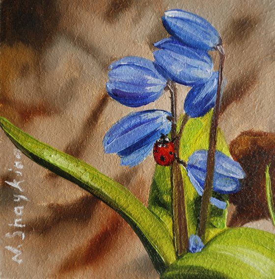 Blue Spring Flowers with Ladybug