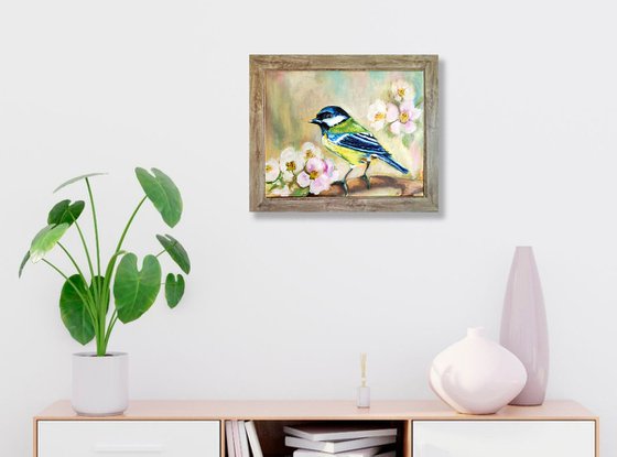 Chickadee on flowering branch