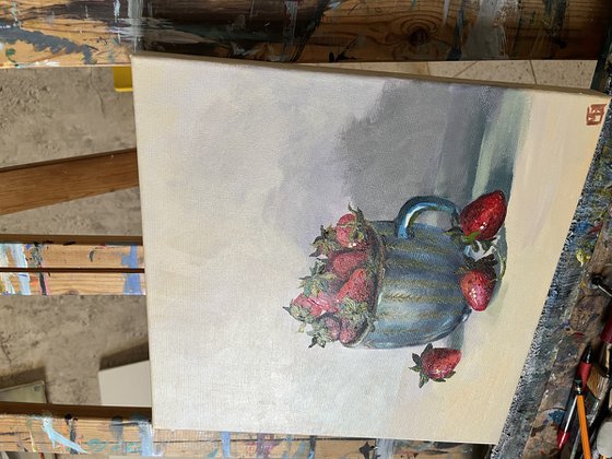 Still life with strawberry mug