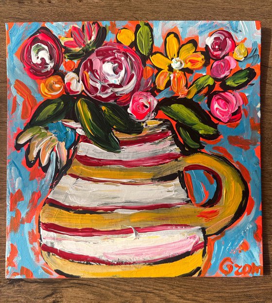 Pot and bright flowers
