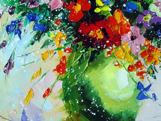 A bouquet of meadow flowers in a vase