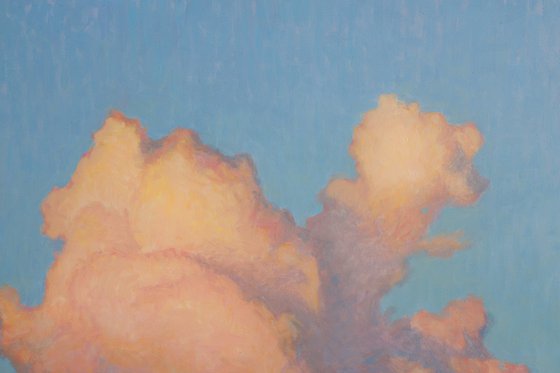 Growing cumulus clouds