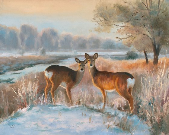 Snowy landscape with deer
