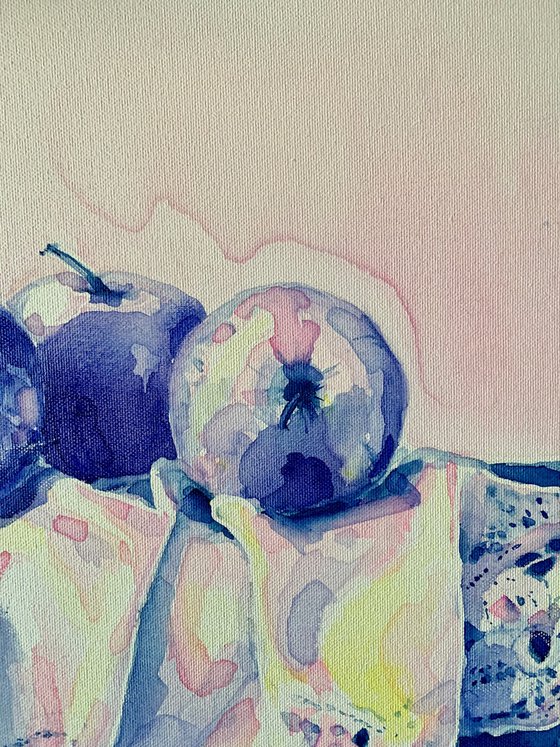 Apples On A White And Calm Blue Tablecloth.