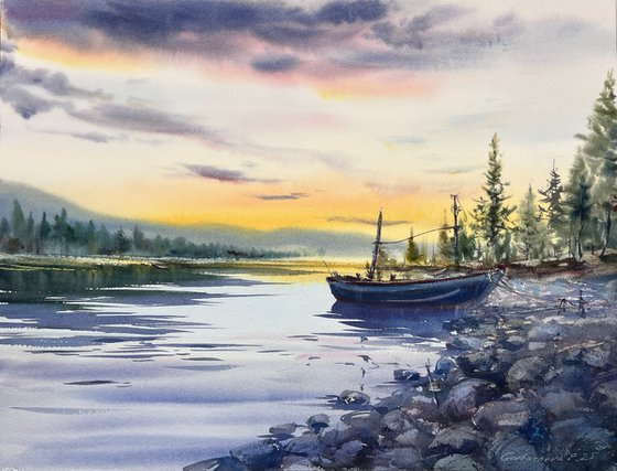 A lonely boat at sunset