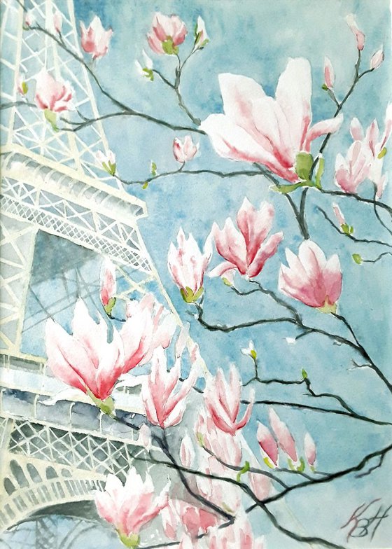 Eiffel tower in blooming magnolia