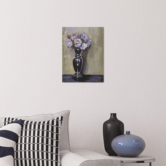 Roses in a glossy vase