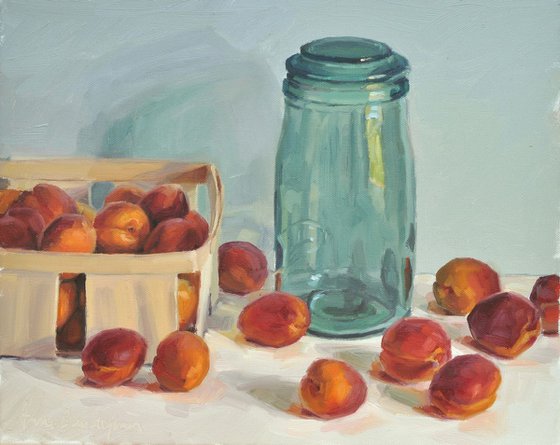Apricots in a crate and old jar
